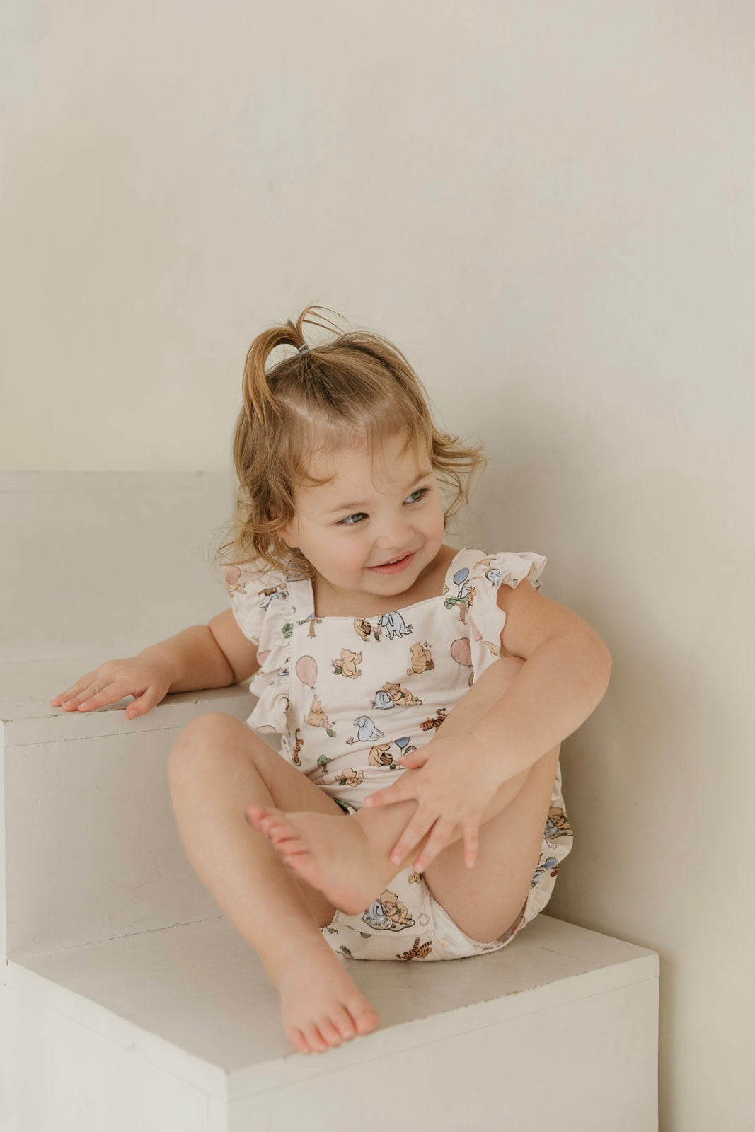 Classic Pooh | Bamboo Cross-Back Ruffle Romper