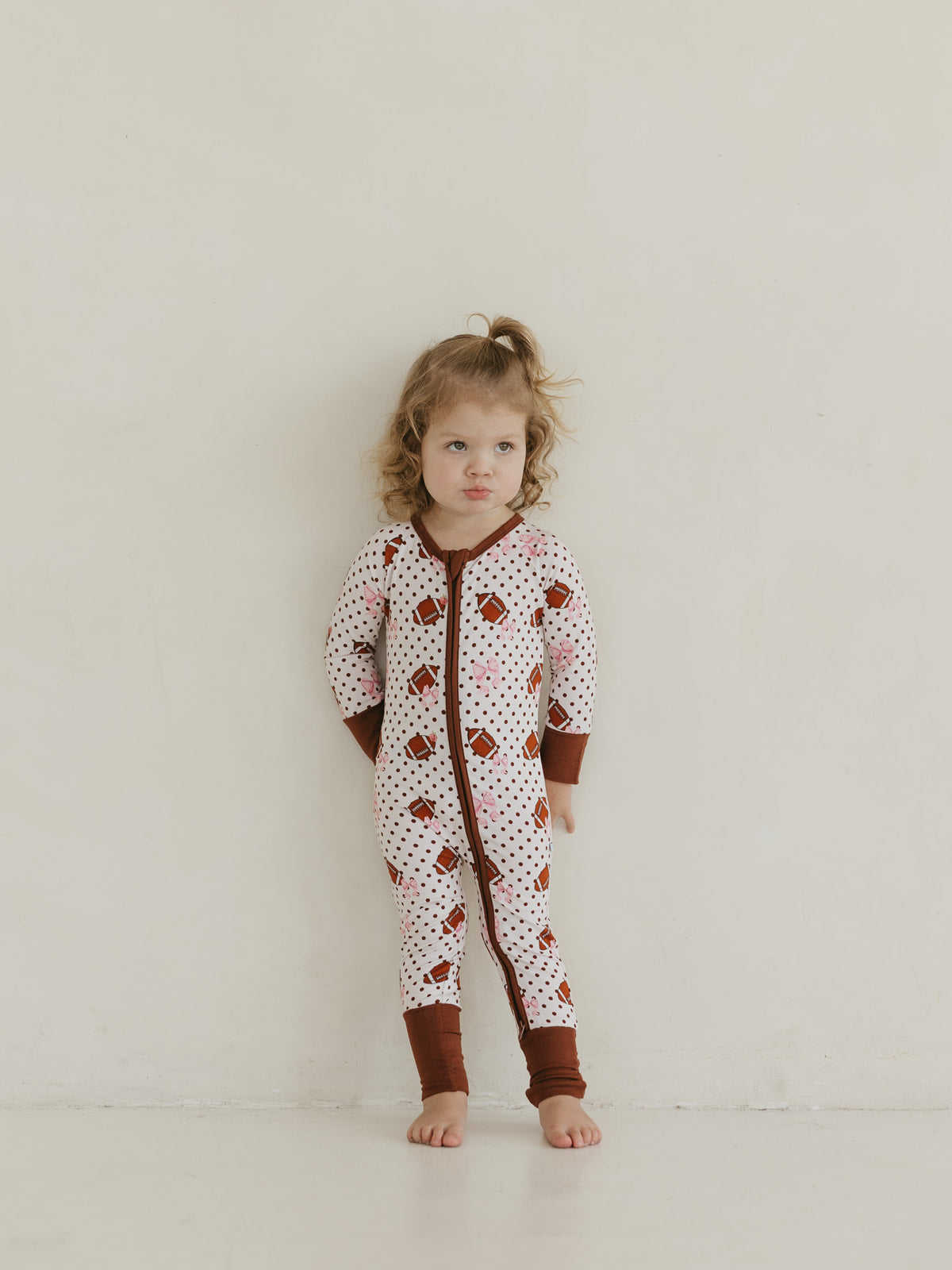 Footballs & Bows | Bamboo Zipper Pajamas