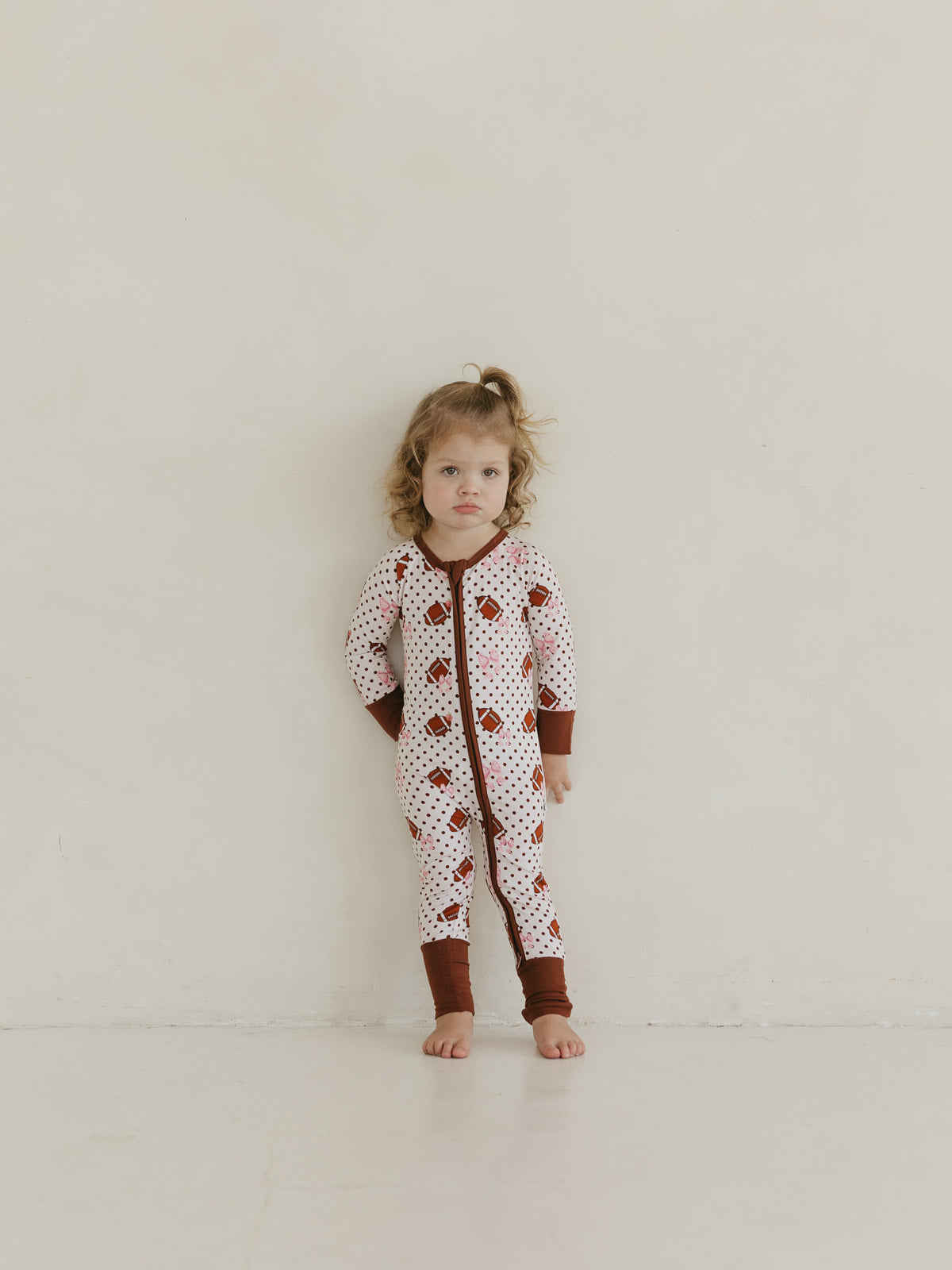 Footballs & Bows | Bamboo Zipper Pajamas
