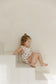 Classic Pooh | Bamboo Cross-Back Ruffle Romper