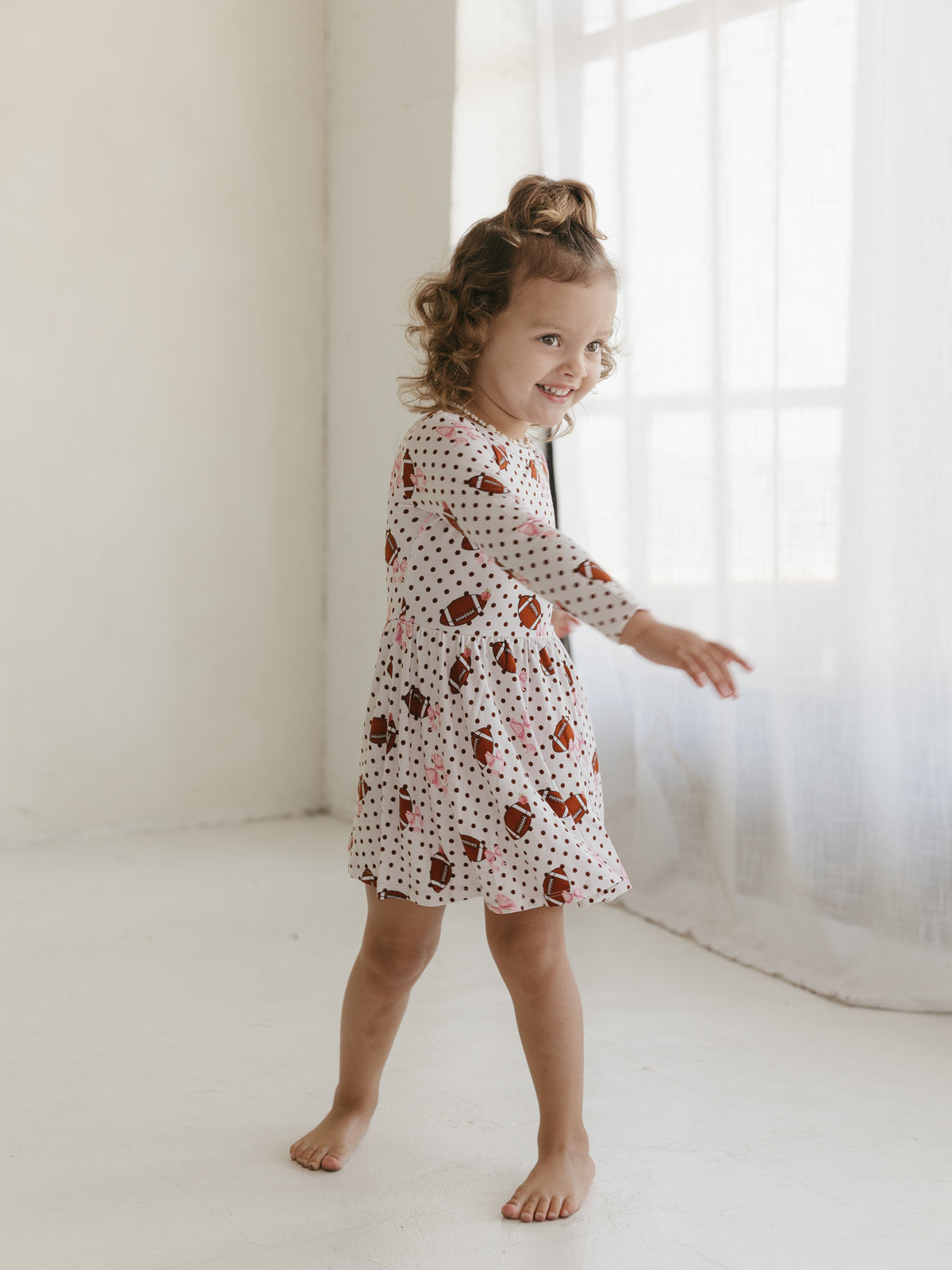 Footballs & Bows | Long Sleeve Twirl Dress