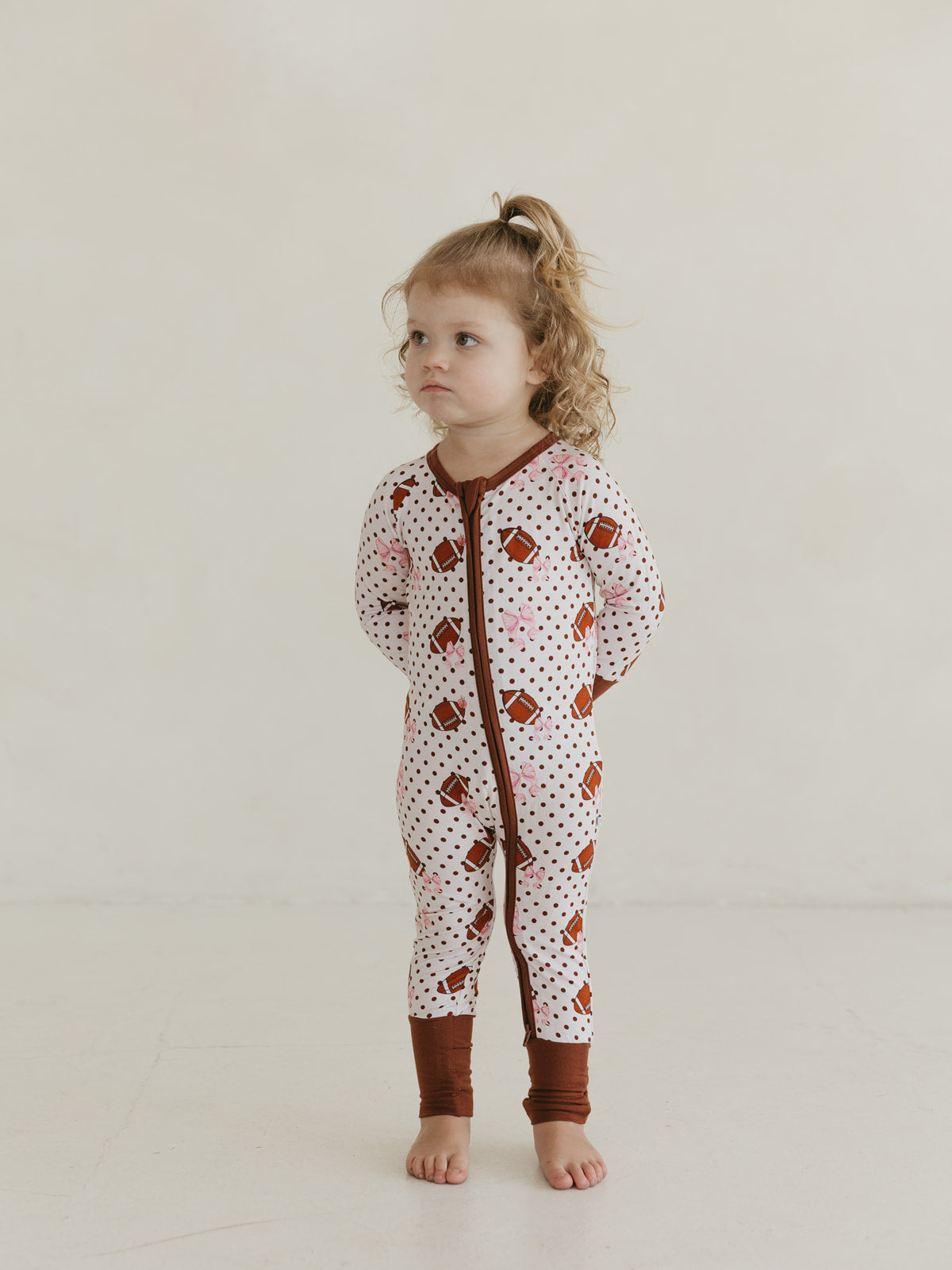 Footballs & Bows | Bamboo Zipper Pajamas